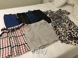 A total of 57 items. Womens clothes size 8/10 and shoes/boots size 4 for sale