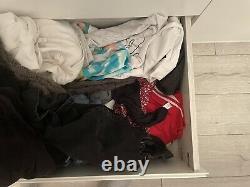 Bundle of men and womens clothing